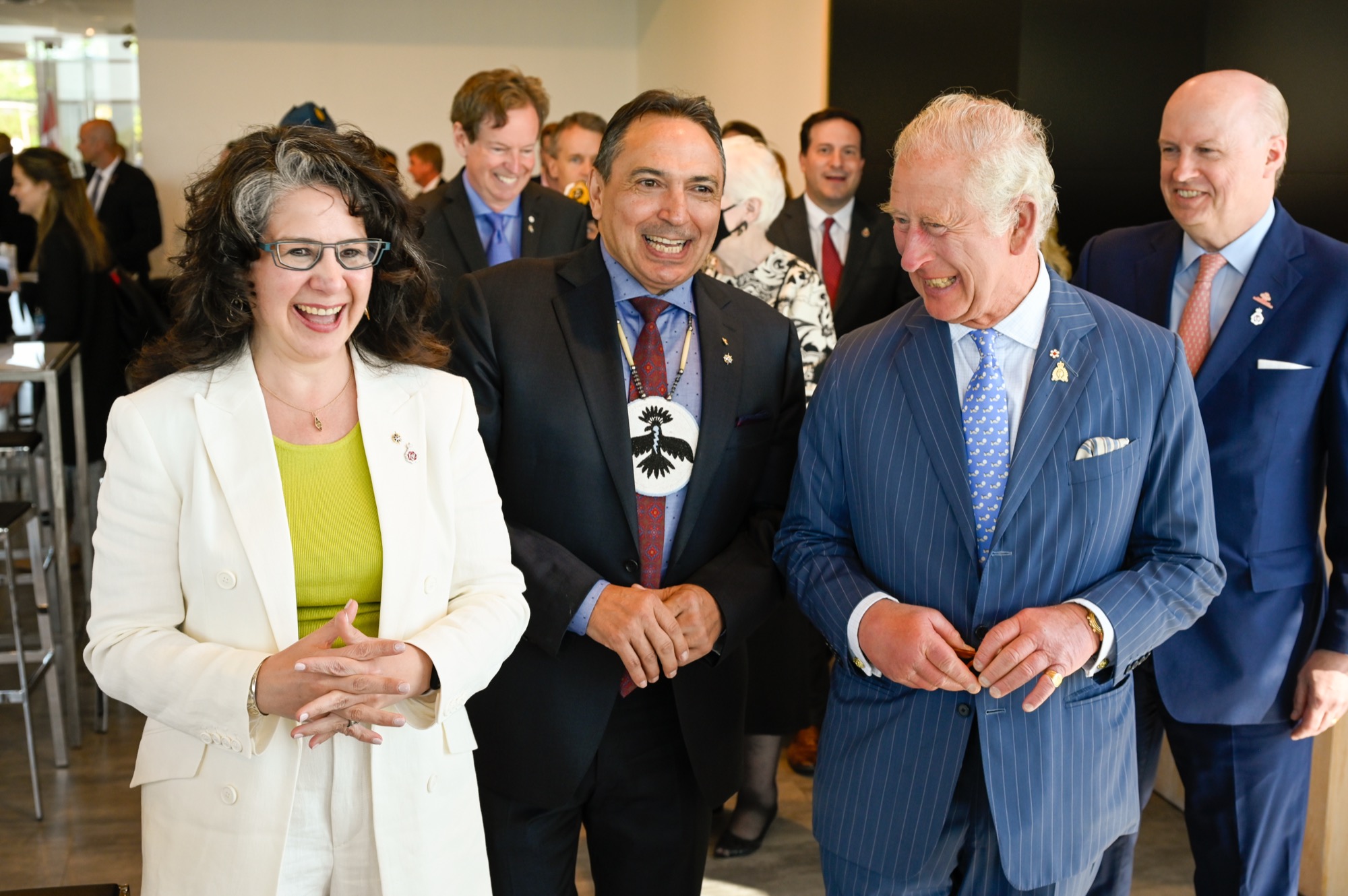 Perry Bellegarde walking with King Charles III, both laughing, Ottawa, 2022